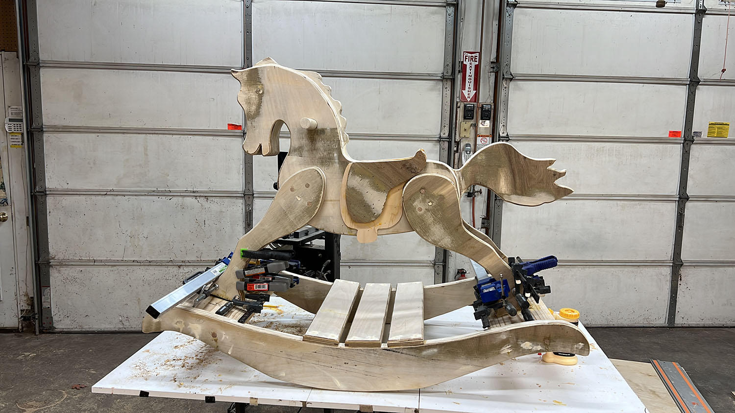 Assembled wooden horse on the base