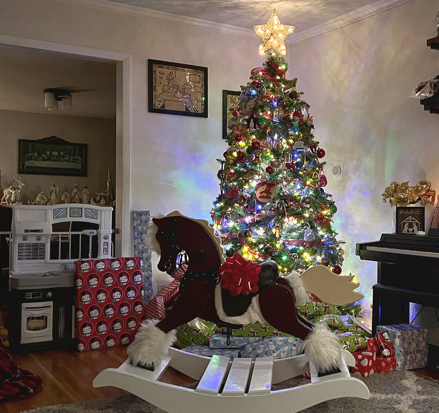 Wooden Horse under Christmas tree
